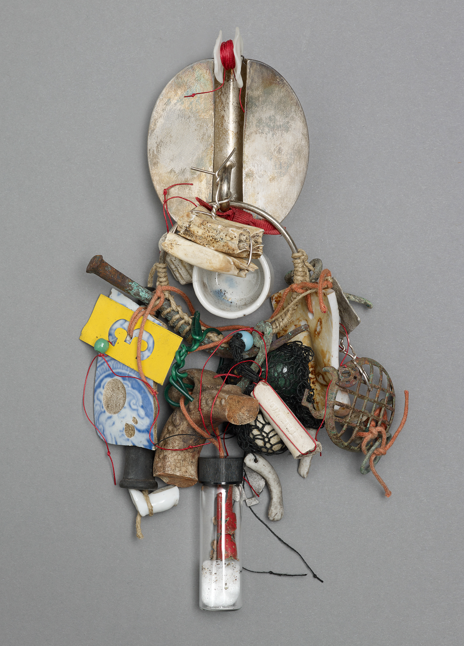 No.0 Item: Brooch H 22cm W 14cm D 4cm Materials: silver, mudlark found objects, textile threads, plastic Photo credit: Michael Pollard