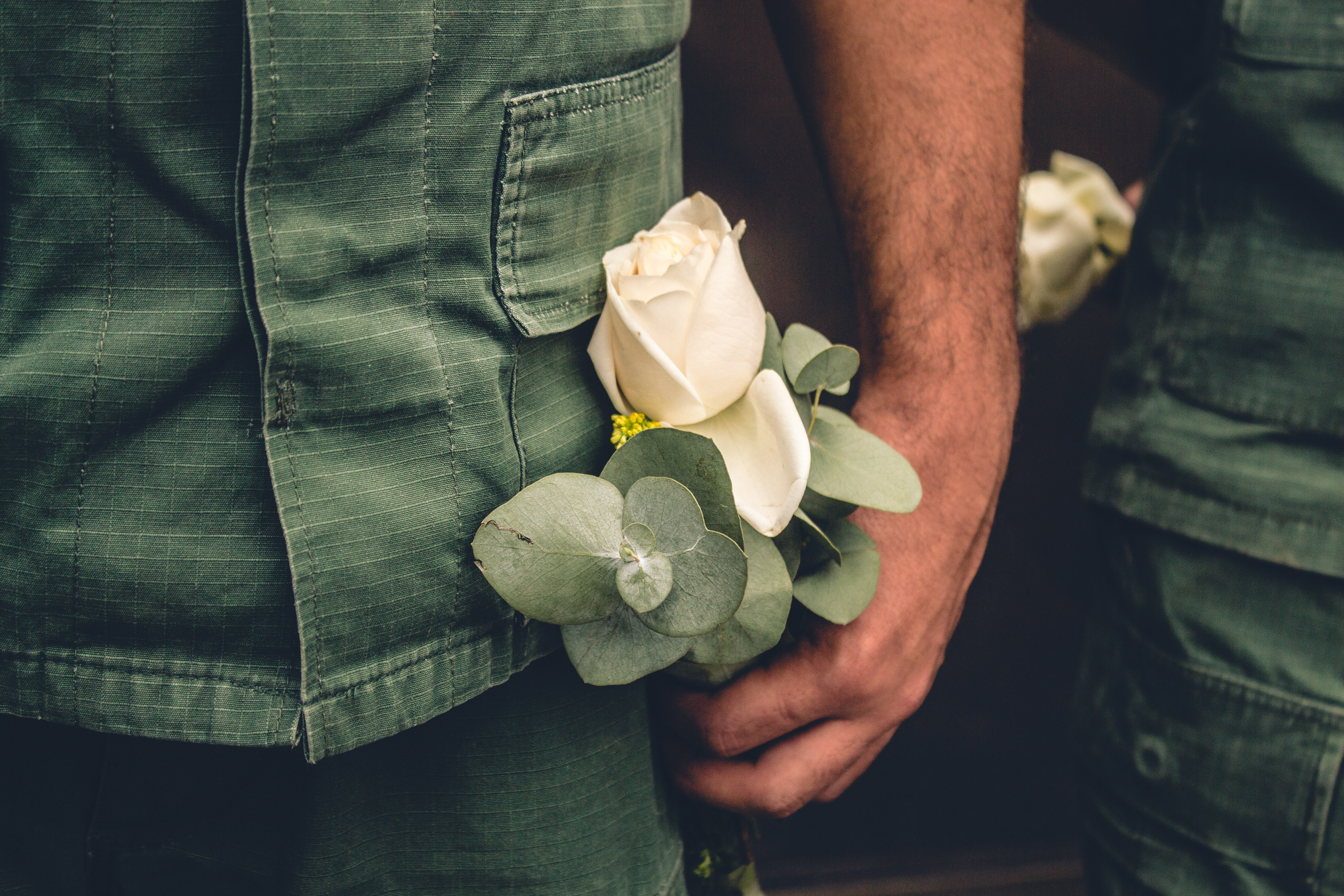 A National Guard holding a flower given to him by a protester on International Women's Day. Caracas 2014