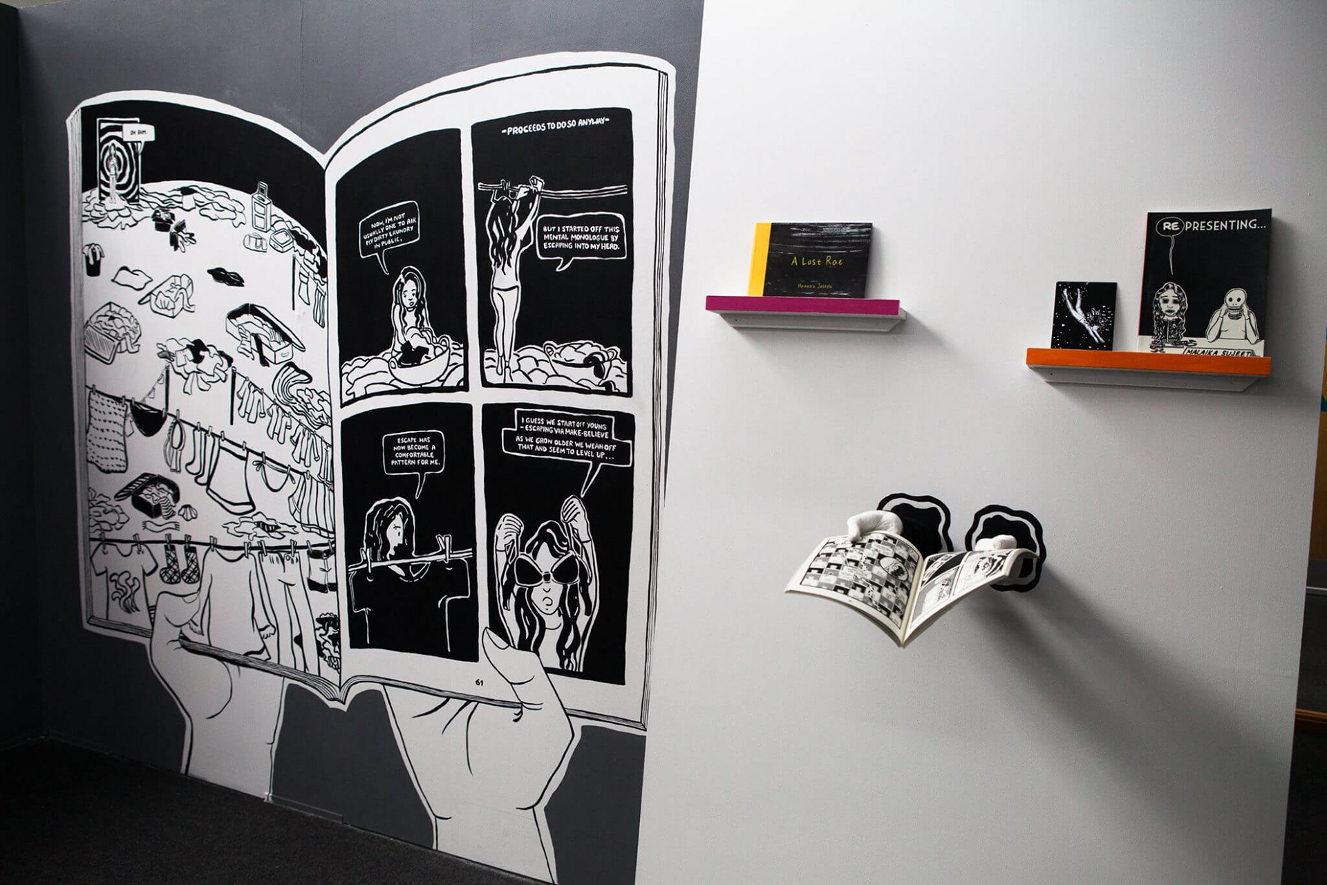 A mural of the book accompanied the exhibit