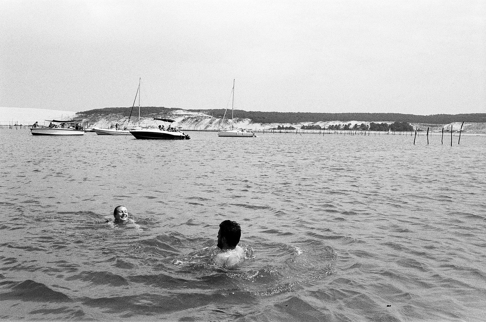 Couple swimming in Banc D'Arguin during summer