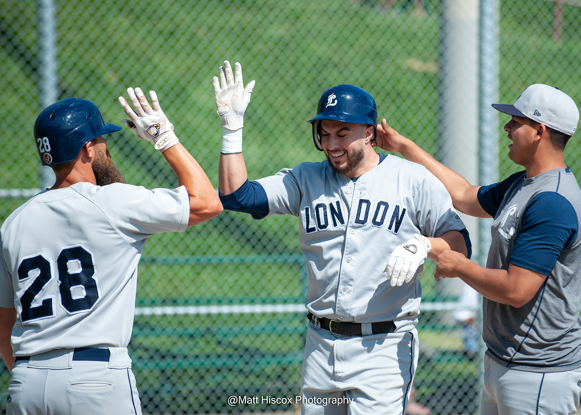 Steve Froese high fives Ismael Pena