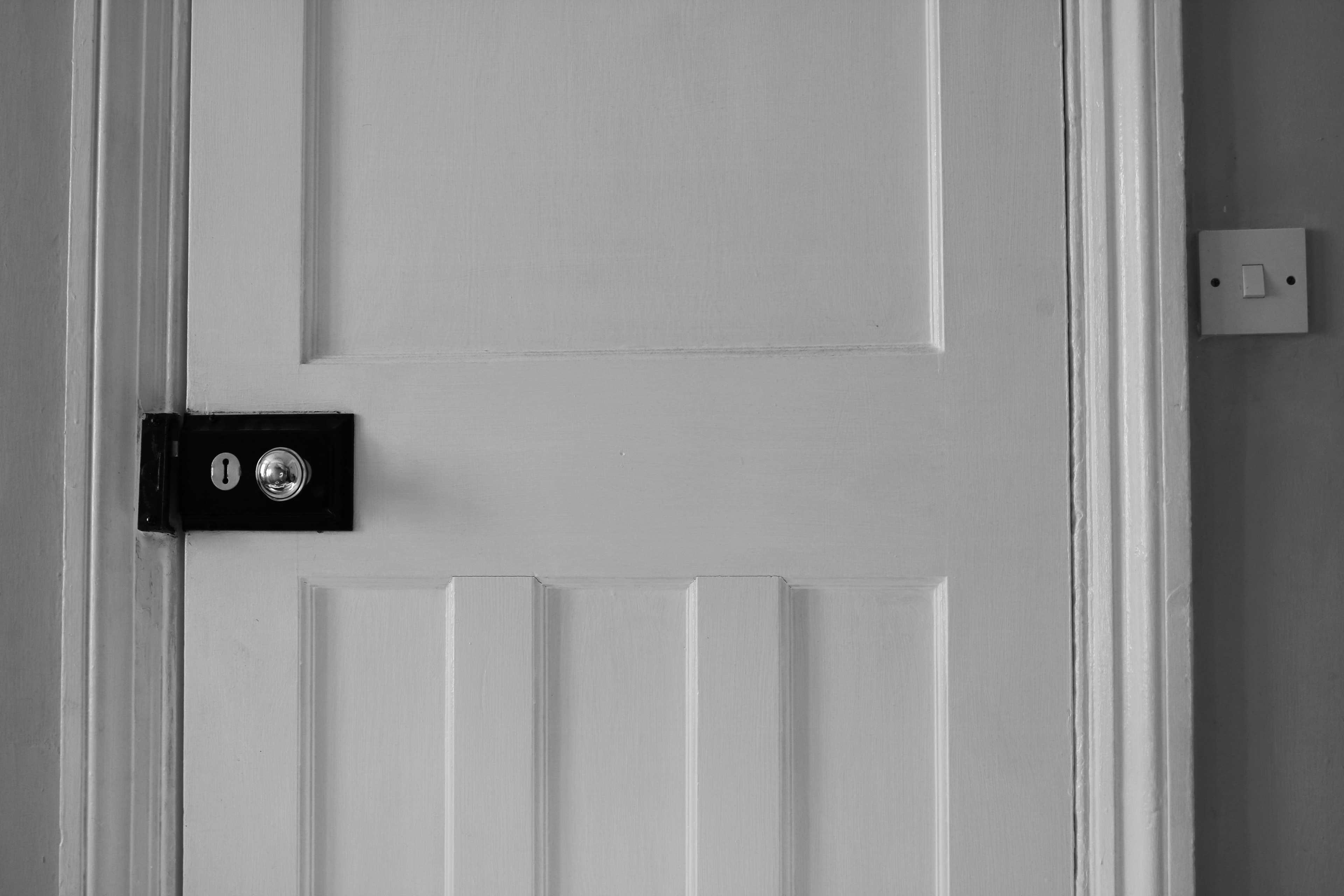 Closed door with lock and key hole