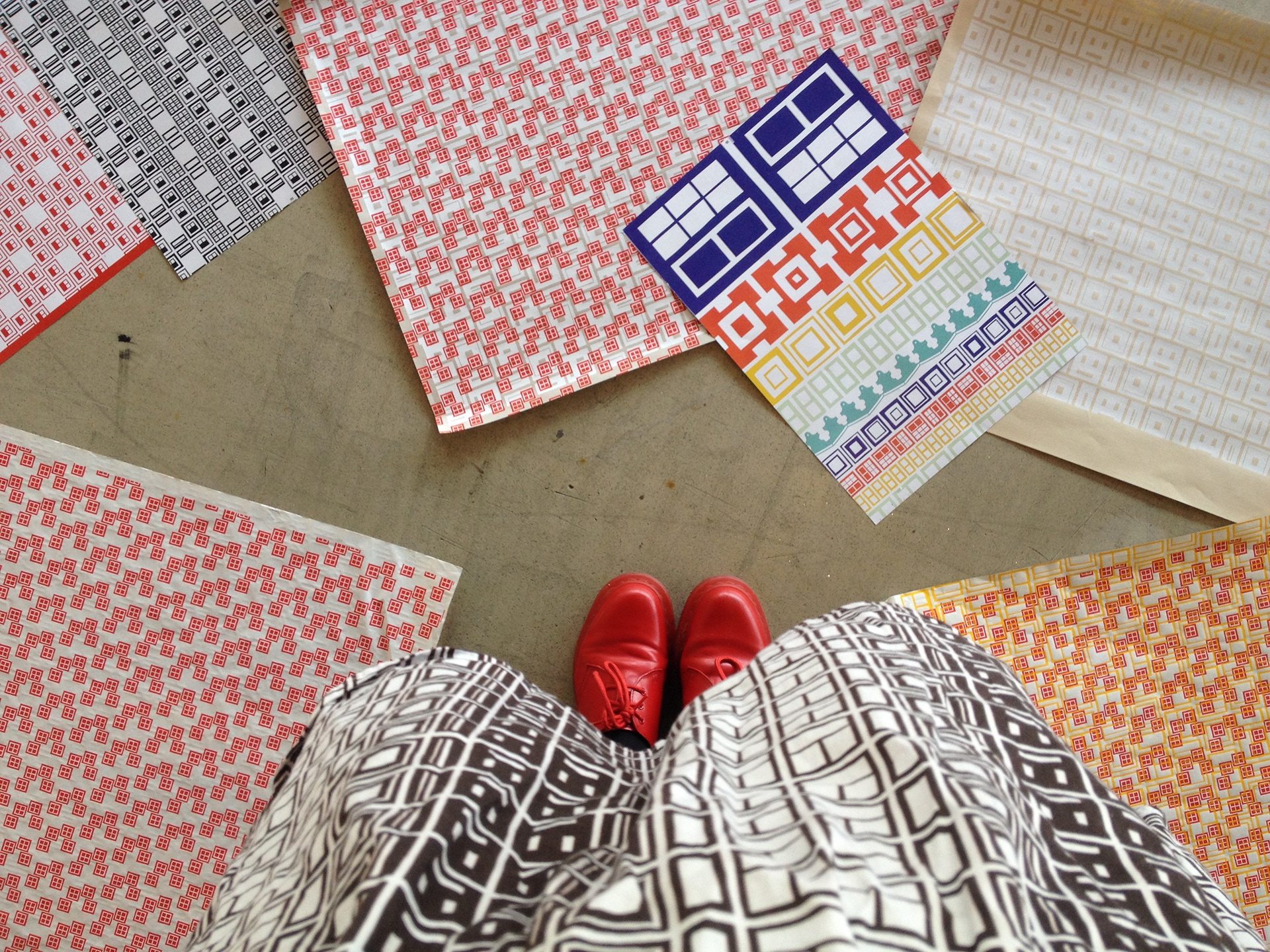 Posters and a skirt with VORMT patterns