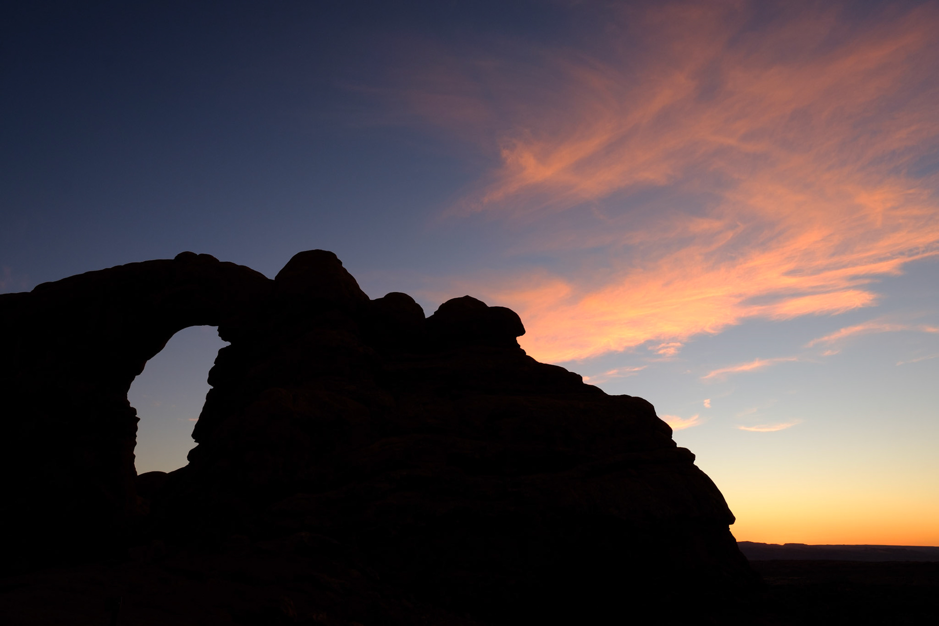 Turret Arch silhouette at sunset