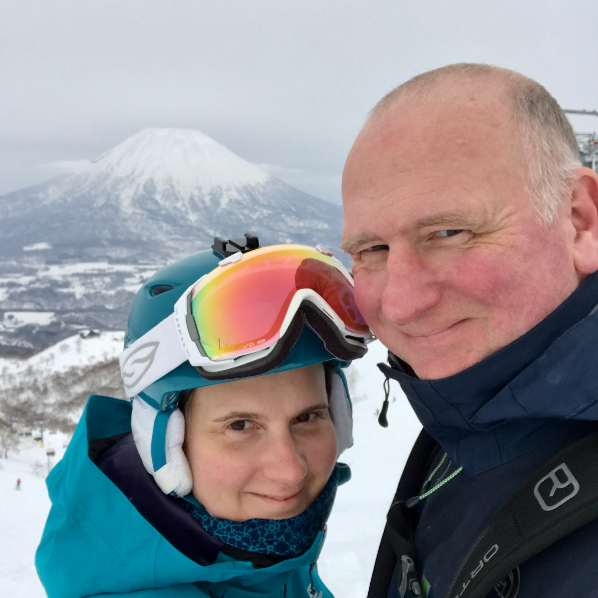 Sue and Alex with Mt Yotei, from the Hirafu slopes