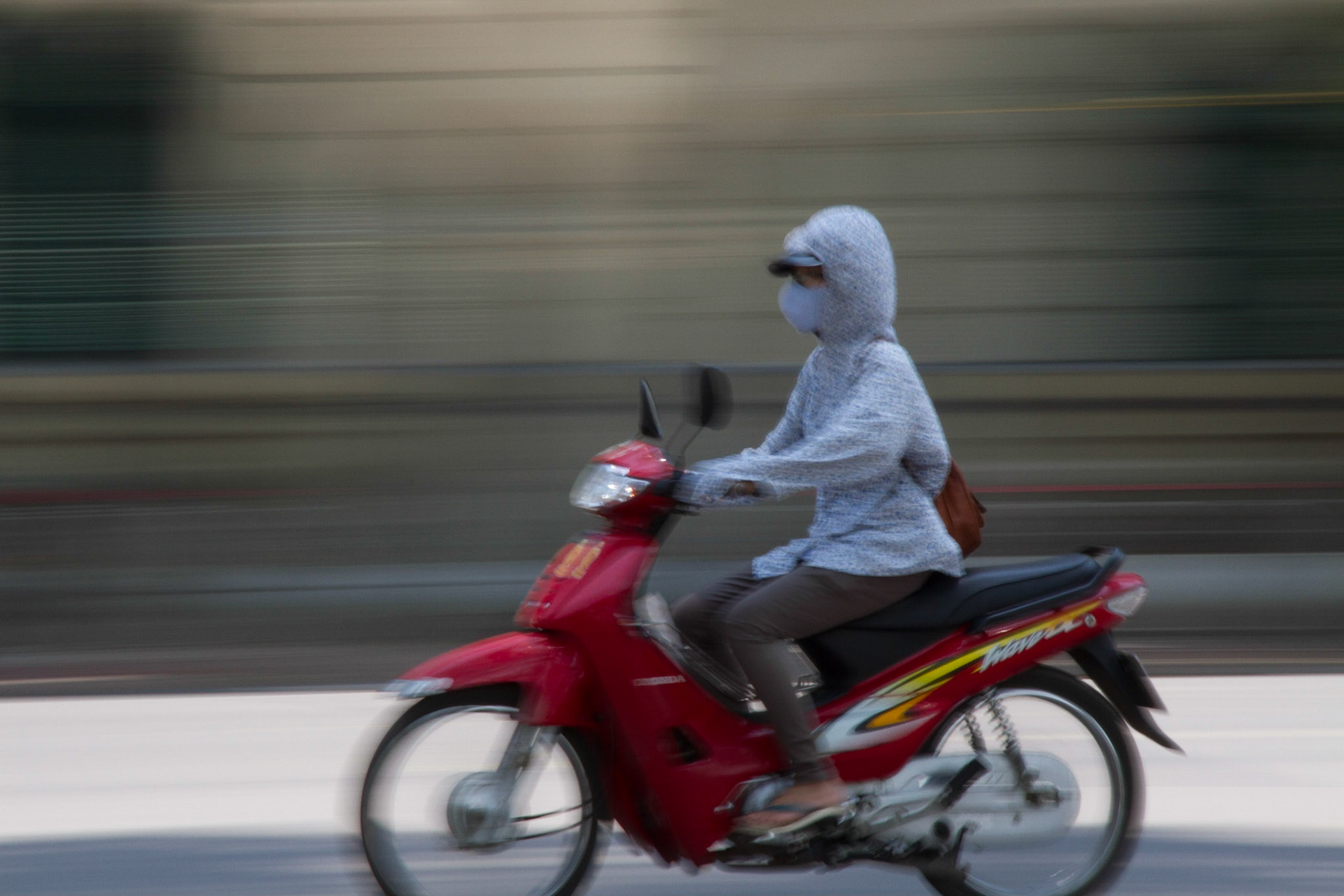 Most women cover up to avoid pollution and fumes