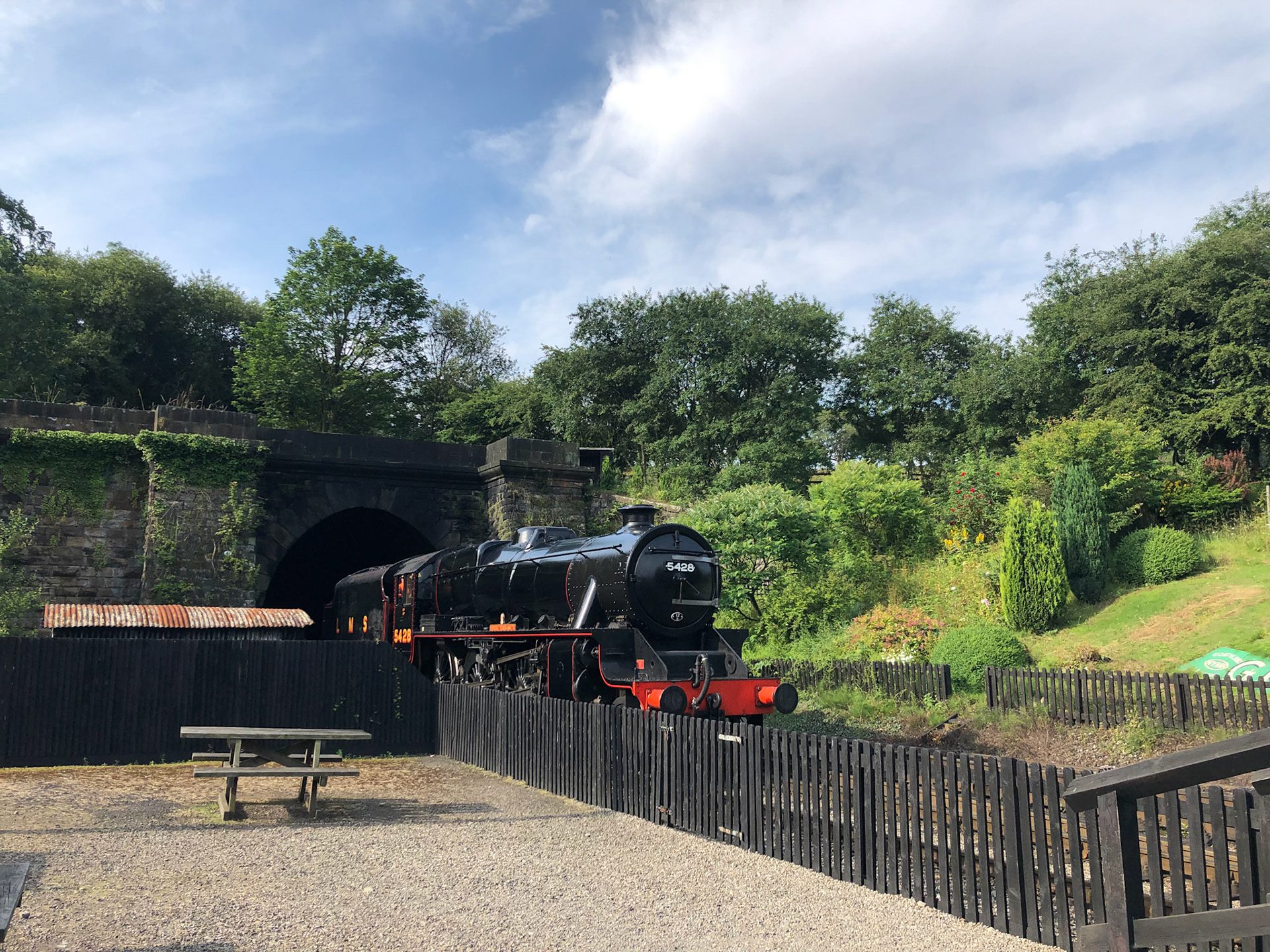 Stram train coming out of the Grosmont tunnel