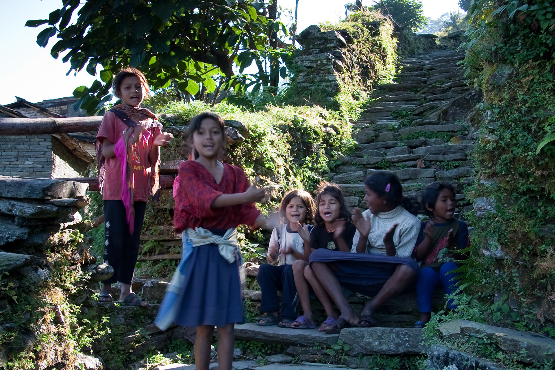 Local children singing and dancing to collect money for Diwali