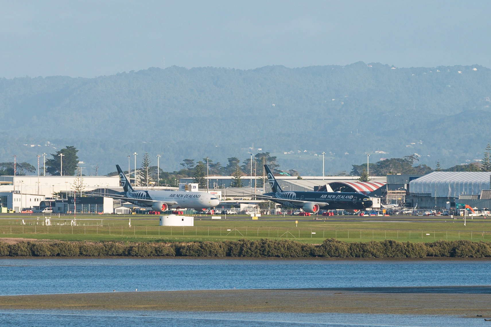 Awaiting their fate. Two Boeing 777-200ERs parked at Auckland, waiting for a trip to the desert.