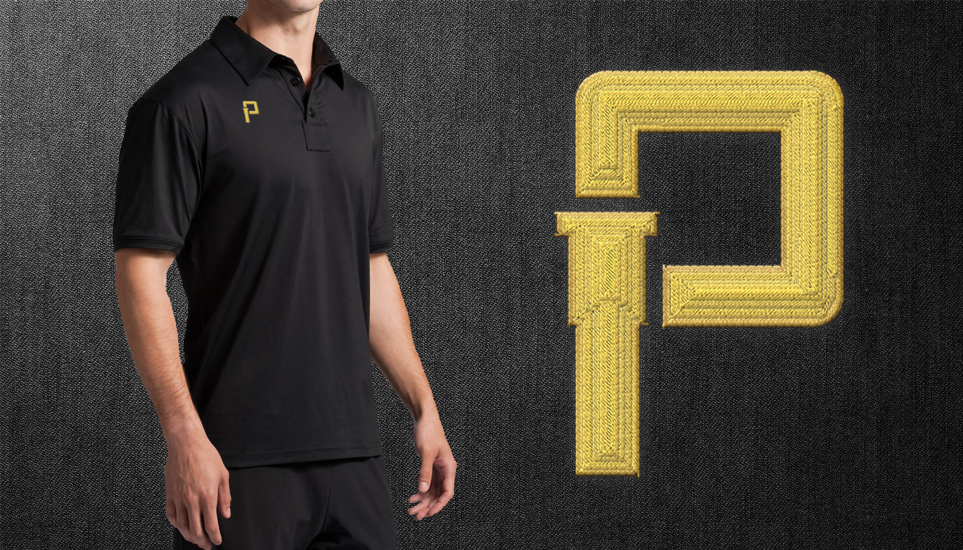 Photo of an embroidered Pole Base symbol shown with yellow embroidery on a black polo