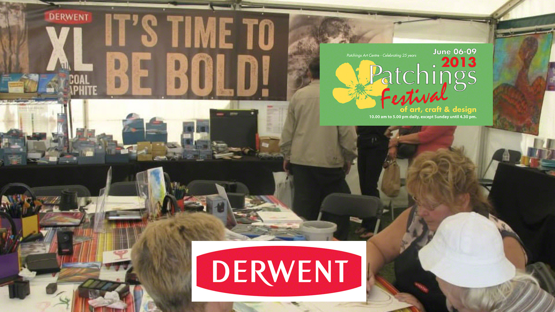 Photo of Anne Corless teaching and demonstrating on the Derwent stand at Patchings Art Festival, UK. 2013.