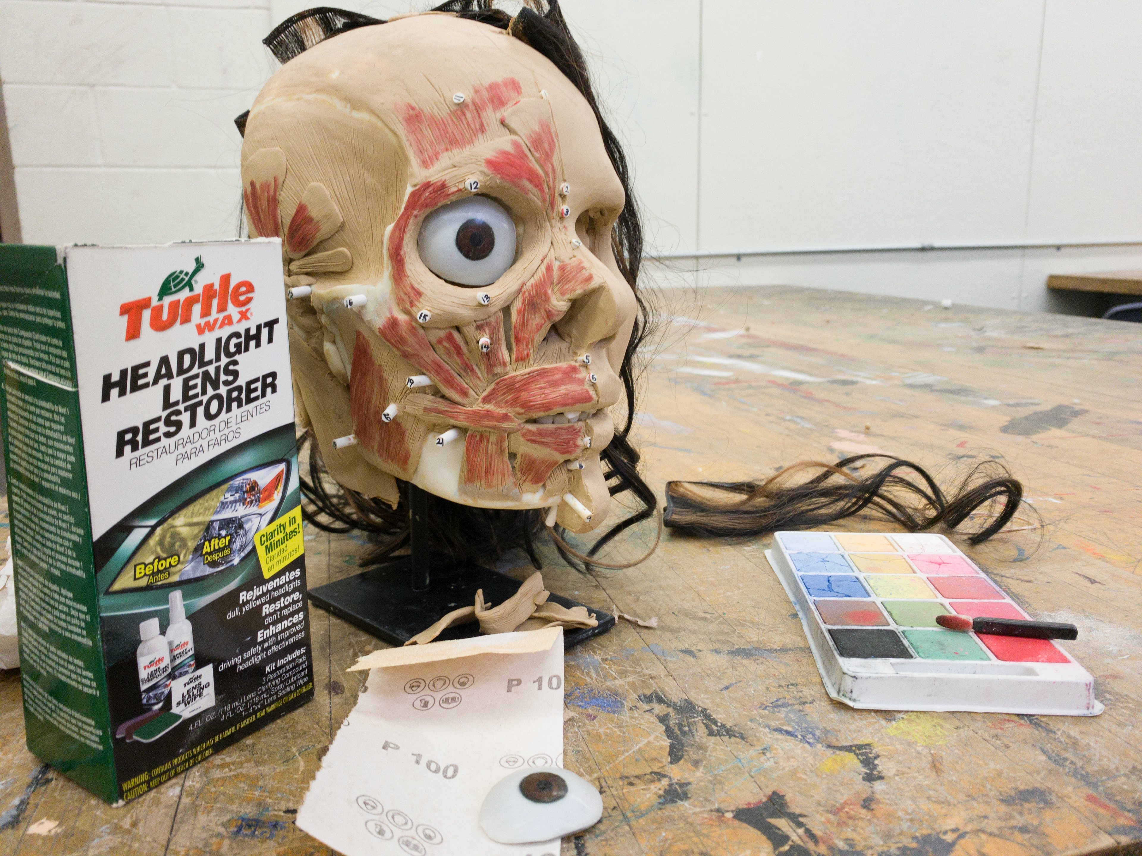 Painted ping-pong ball eyes coated in resin and polished