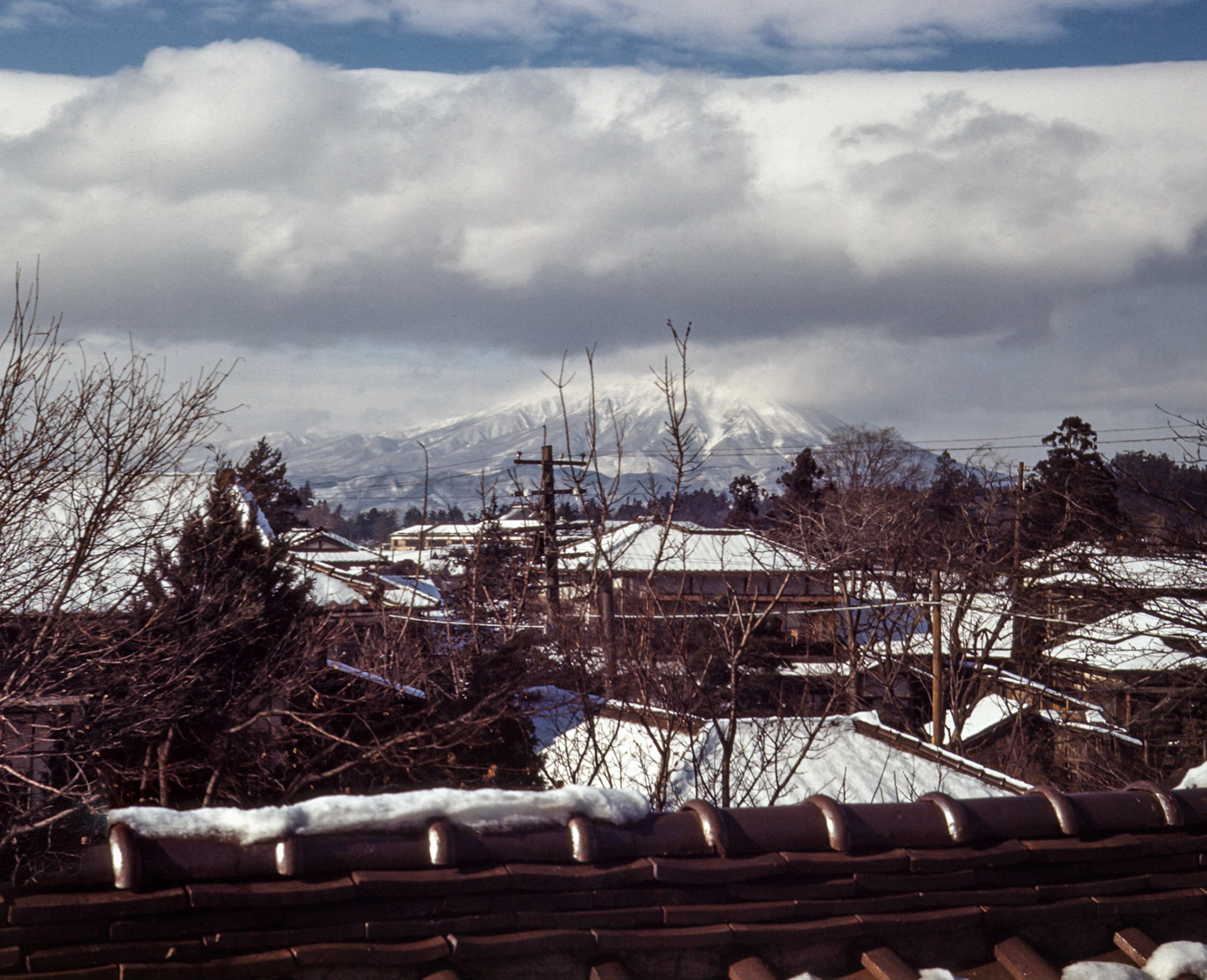 My grandfather took the previous two images from the same spot just by moving the camera vertically. This made it easy for me to stitch them into one picture.