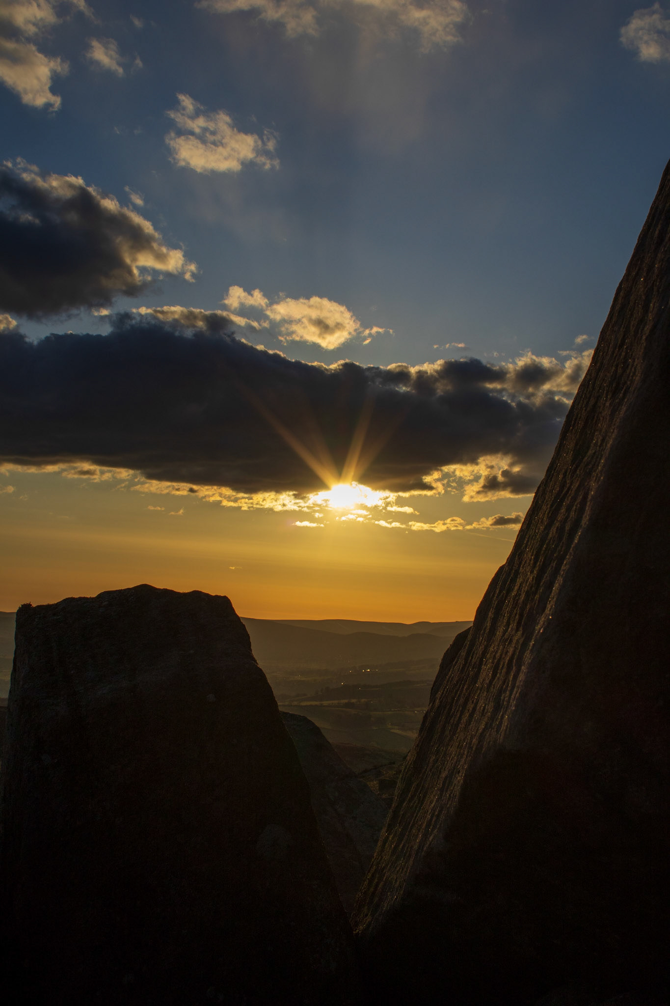 Sunset from below Stanage Edge framed by the rocks