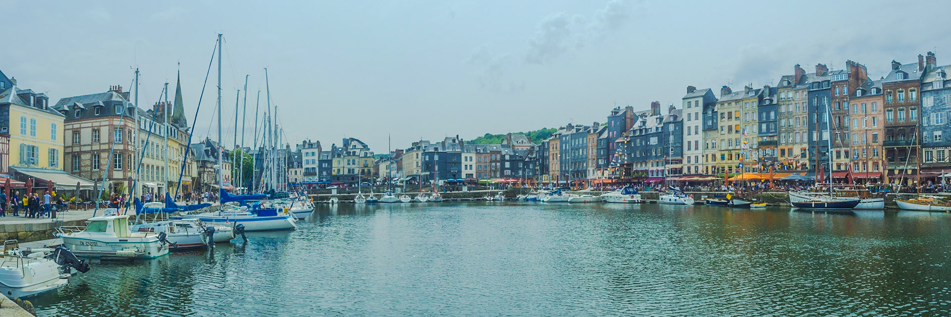 Wide angle view on Le vieux bassin port of Honfleur in Normandy.