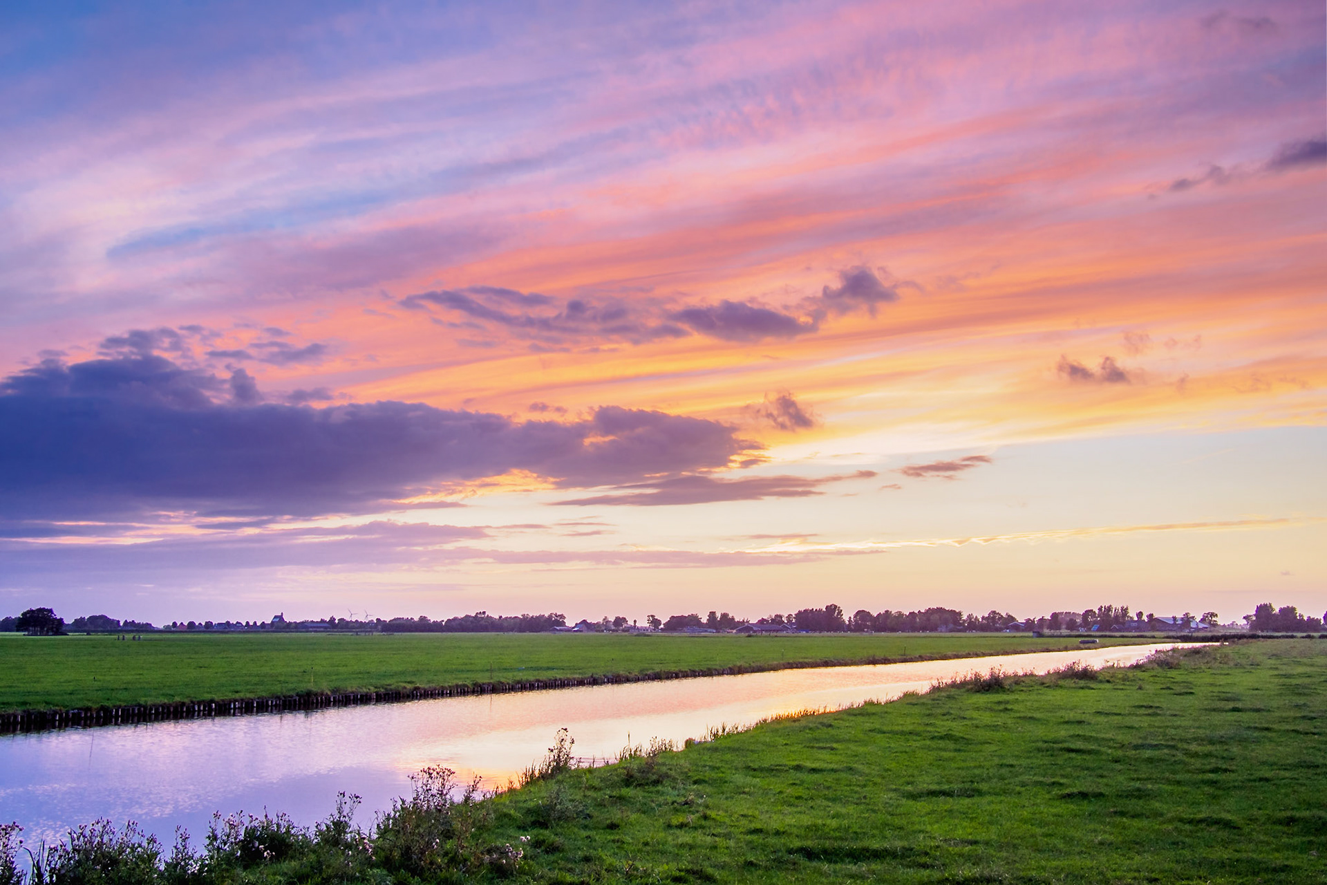 Vivid colored buccolic Sunset over dutch water II