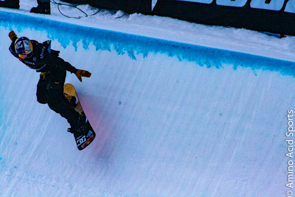 Toby Miller cuts through the cold December air and smoothly lands on his in the halfpipe