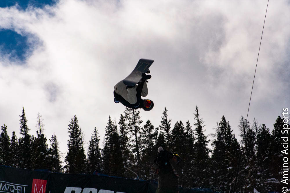Patrick Burgener back flips through the cold December air on Run 2