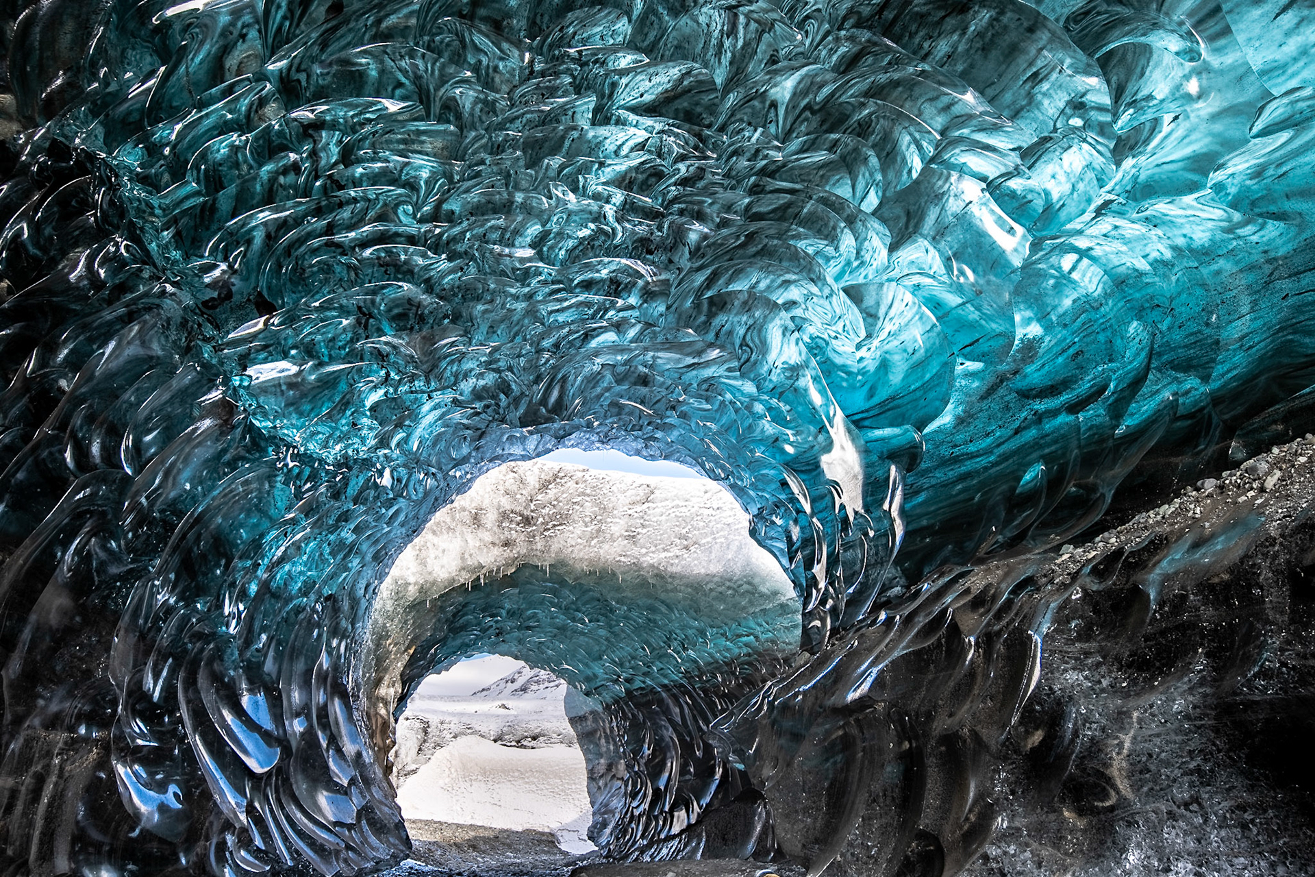 Ice cave in Vatnajokull, Iceland. Also called Crystal Caves, an impressive wonder of nature lies beneath the Icelandic glaciers.