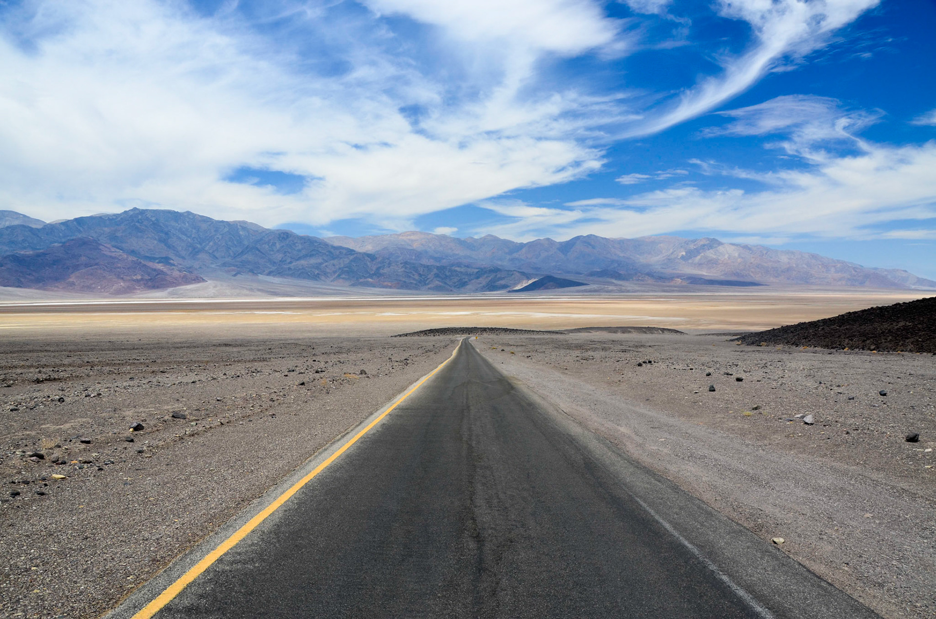 Artists drive heading straight towards Badwater Road, Death Valley, California