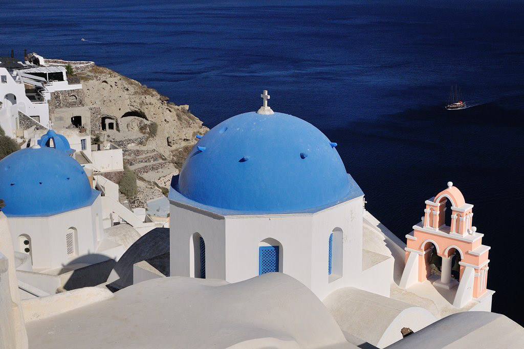The blue domed churches of Santorini, Greece.