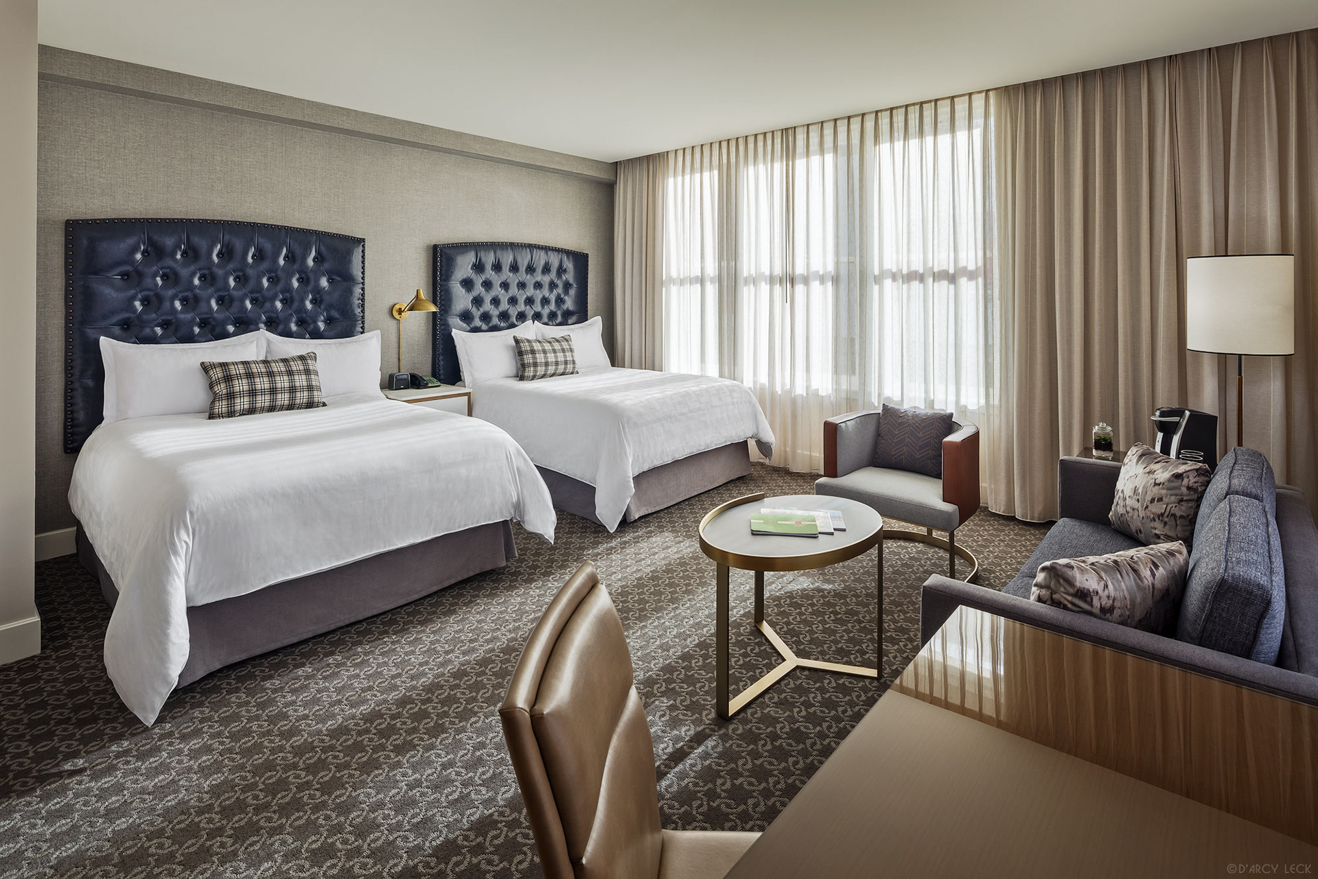 Hotel photographer D'Arcy Leck photographs a guest room at the Hotel Teatro